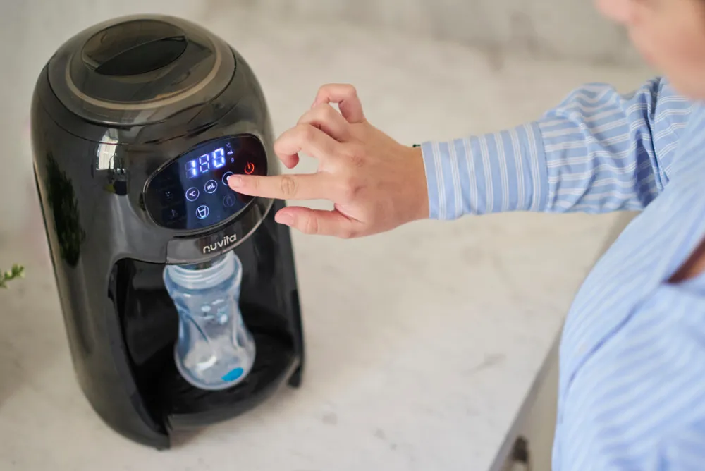 Nuvita 1180 Formula mælke maskine- Tilberedning & Rengøring