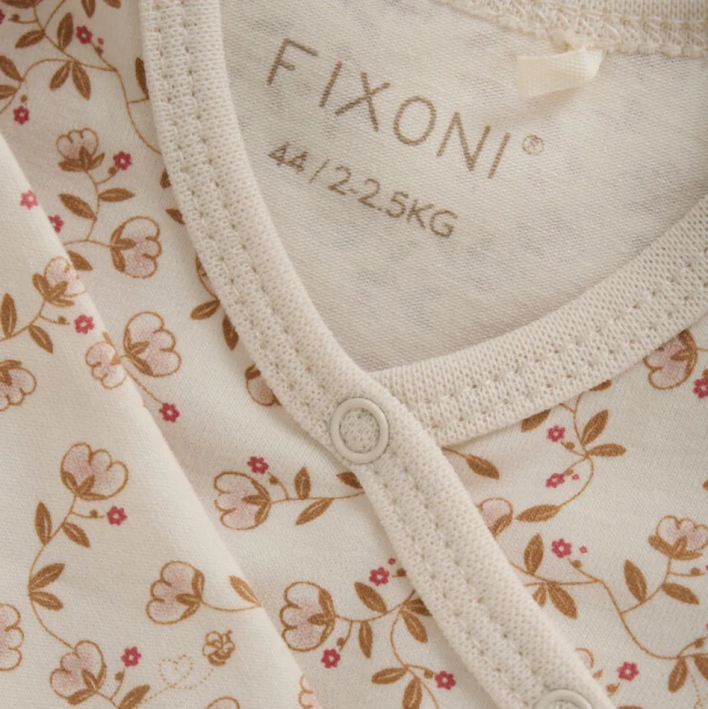 Fixoni Slå-om Body Langærmet AOP - Pale Mauve- Bodystocking M. Skrålukning|Præmatur Tøj