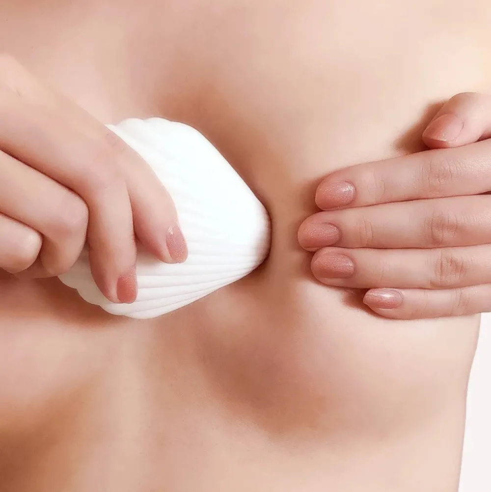 Haakaa Varmende musling massager- Plejeartikler Til Mor